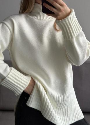 Женский вязаный свитер oversize с разрезами по бокам9 фото