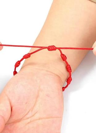 Червоний браслет каббала 7 вузлів на вдачу, оберіг турецьке око