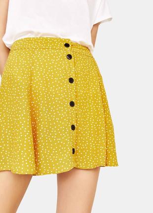 Легка, віскозна юбочка в горох фірми bershka ,розмір с-м