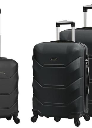 Велика міцна дорожня валіза на 4 колесах пластикова чорна розмір l madisson валіза чотириколісна чемодан на колесах2 фото