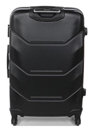 Велика міцна дорожня валіза на 4 колесах пластикова чорна розмір l madisson валіза чотириколісна чемодан на колесах4 фото