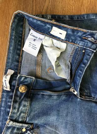Стрейчевые джинсы с цветочным принтом3 фото
