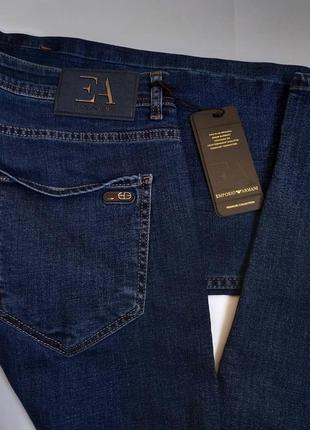 Мужские слегка подуженные джинсы emporio  armani1 фото
