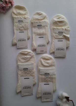 Высокие женские носки молочные структурированные3 фото