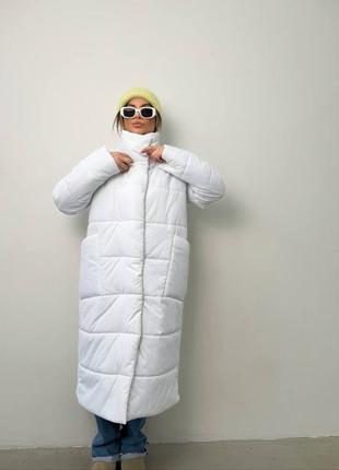 Теплая длинная дутая стеганая зимняя куртка на экопух, объемная куртка на зиму с глубокими карманами на кнопках3 фото