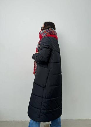 Теплая длинная дутая стеганая зимняя куртка на экопух, объемная куртка на зиму с глубокими карманами на кнопках2 фото