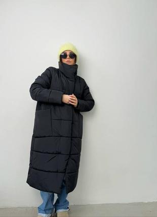 Теплая длинная дутая стеганая зимняя куртка на экопух, объемная куртка на зиму с глубокими карманами на кнопках5 фото