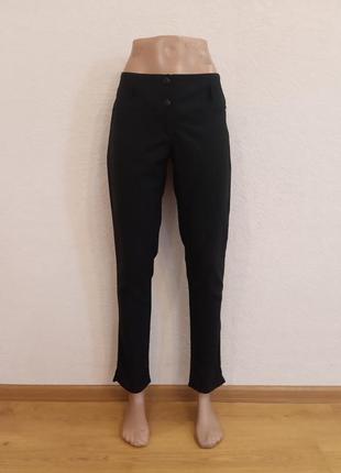 Черные женские брюки из искусственной костюмной ткани3 фото