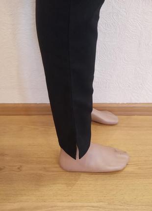 Черные женские брюки из искусственной костюмной ткани5 фото