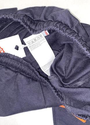 Спортивні штани трьохнитка темно синього кольору з оранжевими шнурками на поясі. пояс регулюється.8 фото