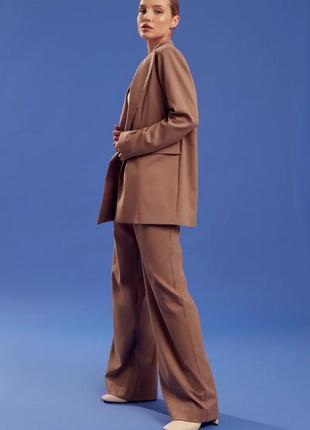 Жіночий костюм з брюками палаццо3 фото