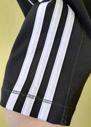 Брендові спортивні шорти для дівчинки adidas climalite капрі чорні бриджі7 фото