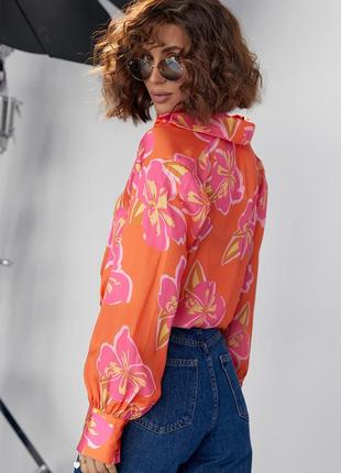 Блуза жіноча шовкова помаранчева на ґудзиках із квітковим візерунком3 фото