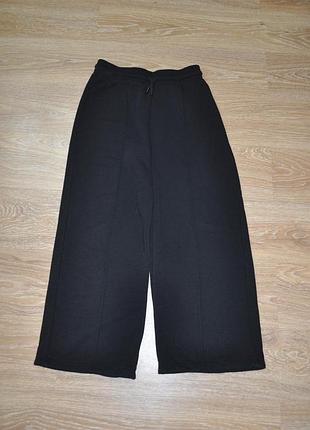 Черные широкие штаны клеш