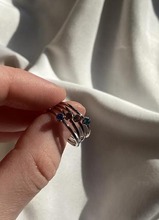 Тонкий серебристый кольцо с камешками2 фото