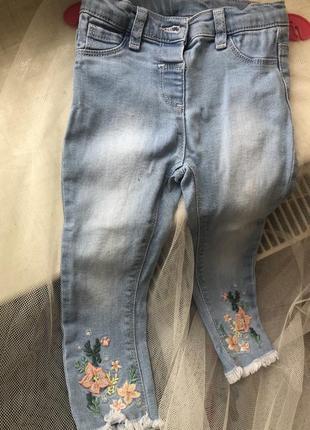 Джинси з вишивкою