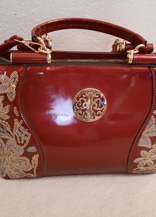Женская новая сумка бордовая2 фото