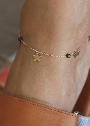 Золотой браслет "звездочки" на ногу (фианиты) 
б048862 фото
