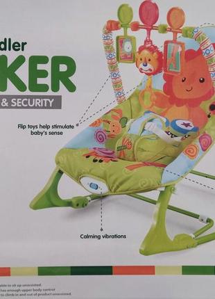 Дитяче крісло-гойдалка - зручне і функціональне крісло-шезлонг.1 фото