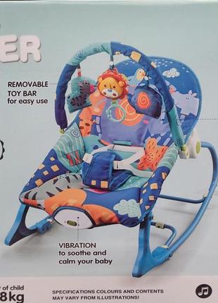 Дитяче крісло-гойдалка - зручне і функціональне крісло-шезлонг.