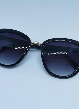Солнцезащитные очки женские кошачий глаз чёрные с золотистыми вставками1 фото
