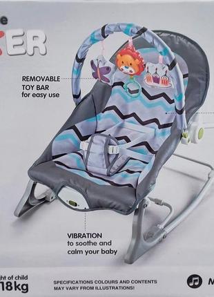 Дитяче крісло-гойдалка — зручне та функціональне крісло-шезлонг.1 фото
