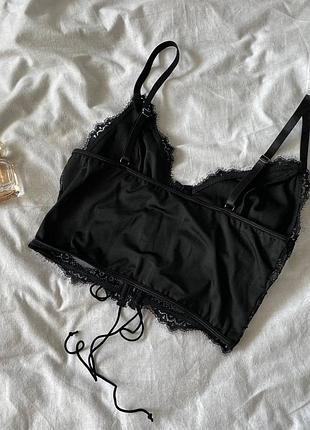 Кроп-топ на шнуровке с косточками на талии🤍