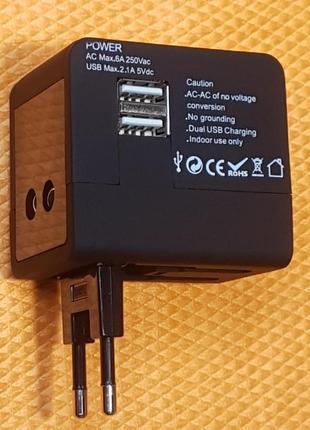 Универсальное зарядное устройство travel 3в1  (uk, eu, us) 2usb 6a black. белый
