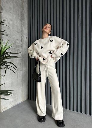 Костюм свитер с сердечками и брюки производство туречки