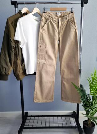 Бежевые широкие джинсы с низкой посадкой