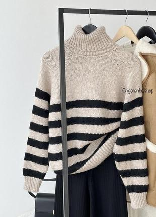 Вязаный женский свитер в полоску1 фото