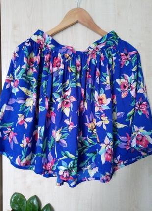Яркая летняя юбка в цветочный принт размер м1 фото