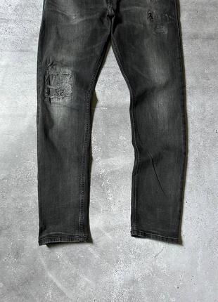 Серые джинсы diesel tepphar distressed slim-carrot8 фото