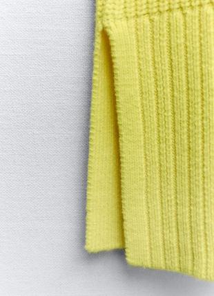 Трикотажный свитер с розрезами по бокам9 фото