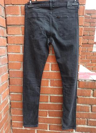 Оригинальные брендовые стрейчевые джинсы3 фото