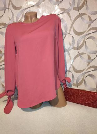 Красивая блуза с завязками на рукавах от бренда dunnes