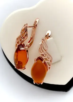 Позолочені сережки з бурштином (медичне золото)