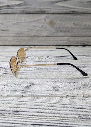 Солнцезащитные очки прямоугольные, золотистые, унисекс  в золотистой  оправе ( без бренда )5 фото