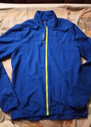Легка фірмова куртка синього кольору для занять спортом (оригінал)унісекс подарунок3 фото