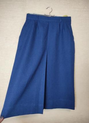 Классическая юбка юбка миди с складкой и карманами1 фото