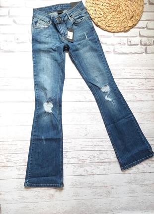 Джинси кльош