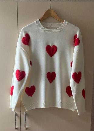 Вязаный светр з сердечками. размер м. ціна 900   грн.1 фото