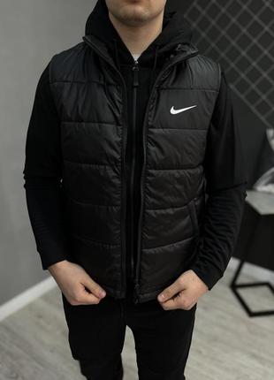 Жилетка чорна nike🦺1 фото