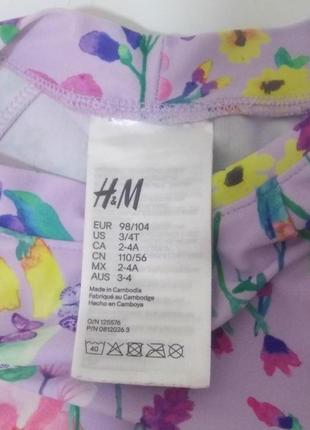 Сиреневая солнцезащитная футболка h&m с цветочным принтом на девочку 2-4 года4 фото