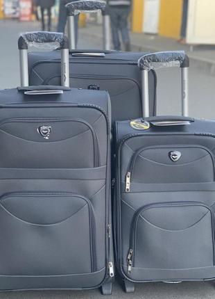 Средний текстильный чемодан 4 колеса wings дорожный тканевый чемодан четырехколесный из ткани чемодан m ткань10 фото
