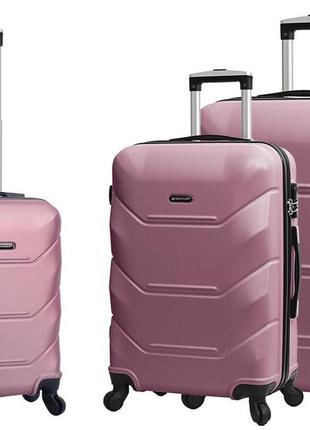 Дорожня велика якісна валіза на 4 колесах розмір l madisson жіноча валіза пластик рожеве золото чемодан4 фото