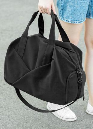 Жіноча дорожня спортивна сумка з відділення під взуття vast  на 34 літрів чорна з матеріалу soft shell5 фото