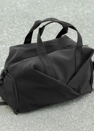 Жіноча дорожня спортивна сумка з відділення під взуття vast  на 34 літрів чорна з матеріалу soft shell8 фото