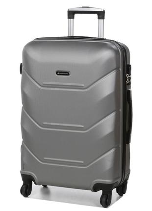 Средний дорожный чемодан пластиковый на 4 колесиках madisson размер м средний чемодан прочный цвет сирибристый1 фото