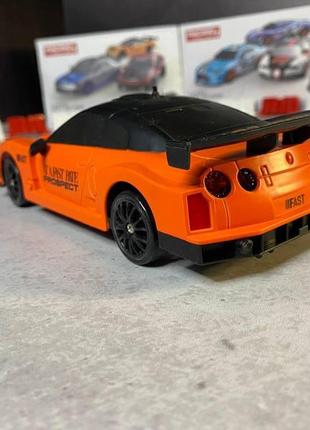 Дрифт машинка на радиоуправлении nissan skyline gt-r оранж. машинка на пульте...